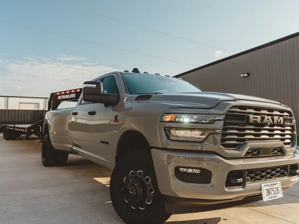 A Colby Transport Ram 3500 hooked to a gooseneck flatbed outside the Oklahoma City terminal.