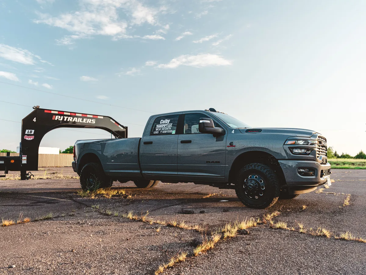 A Ram 3500 coupled to a gooseneck flatbed.
