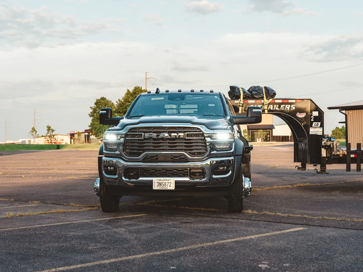 Front view of a Colby Transport Ram 5500 with trailer attached.